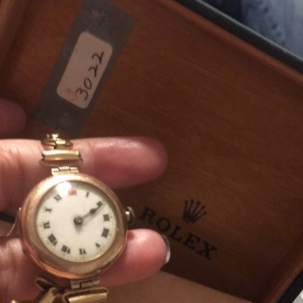 Rolex w Appraisal watch 9Count real gold marked case inside working manual.